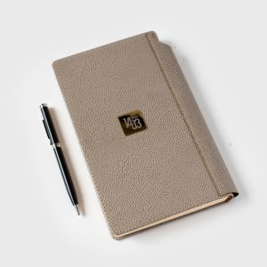 rath notebook with pen